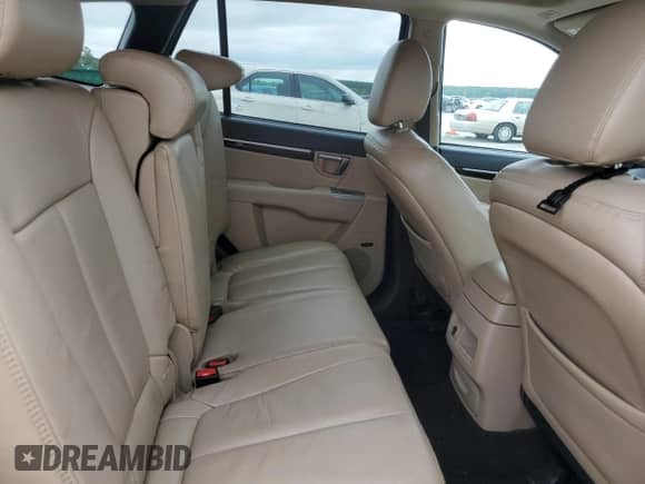 2011 Hyundai Santa Fe Limited с VIN 5XYZK4AG0BG051869, выставлен на аукционе Copart как лот 67940835 с пробегом 154 935 миль миль и Списание • Salvage title. История ставок и продаж доступна на DreamBid. Изображение 11.