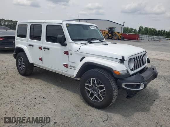 2024 Jeep Wrangler Sahara with VIN 1C4PJXENXRW120231, listed as a Copart auction lot 59659455 with 25,775 mi miles and Salvage title. Bid and sale history available at DreamBid. Image 4.