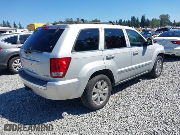 2008 Jeep Grand Cherokee Limited z VIN 1J8HR58238C189595, wystawiony jako IAAI lot #42837942 z przebiegiem 142 538 mil mil oraz . Historia ofert i sprzedaży dostępna na DreamBid. Obrazek 4.
