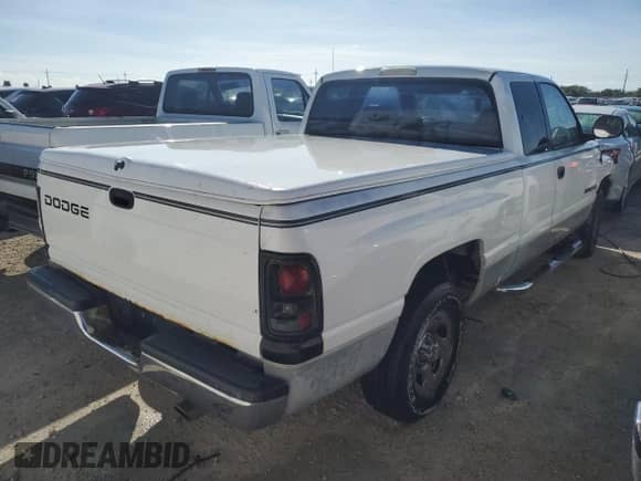 2001 Dodge 1500 с VIN 3B7HC12Y11G169962, выставлен на аукционе Copart как лот 79892374 с пробегом Не указан миль и На запчасти • Non repairable. История ставок и продаж доступна на DreamBid. Изображение 3.