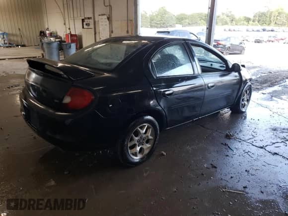 2002 Dodge Neon ES with VIN 1B3ES56C52D625182, listed as a Copart auction lot 69001705 with 234,323 mi miles and Salvage title. Bid and sale history available at DreamBid. Image 3.