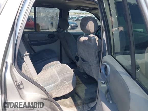 2003 Chevrolet TrailBlazer LT with VIN 1GNDS13S332297960, listed as a IAAI auction lot 42754802 with 216,615 mi miles and . Bid and sale history available at DreamBid. Image 8.