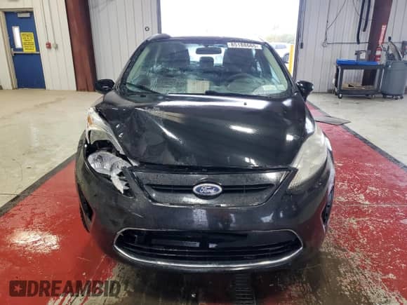 2011 Ford Fiesta SE with VIN 3FADP4EJ5BM108674, listed as a Copart auction lot 85188665 with 77,542 mi miles and Salvage title. Bid and sale history available at DreamBid. Image 5.
