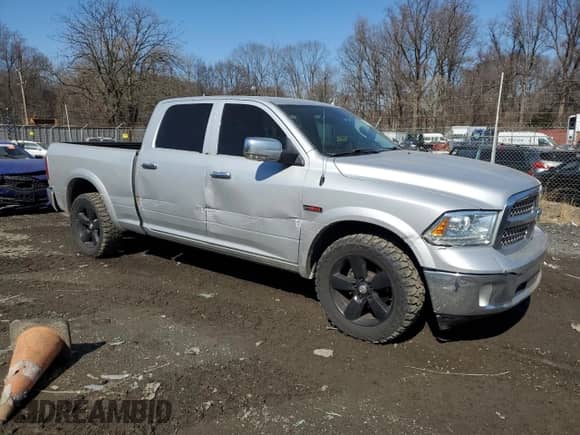 2014 Ram 1500 Laramie z VIN 1C6RR7VM8ES434719, wystawiony jako Copart lot #47923295 z przebiegiem 145 546 mil mil oraz Szkoda całkowita • Salvage title. Historia ofert i sprzedaży dostępna na DreamBid. Obrazek 4.