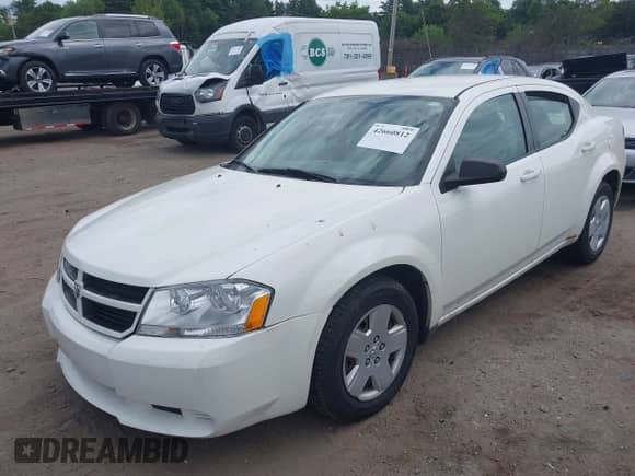 2009 Dodge Avenger SE with VIN 1B3LC46B59N509605, listed as a IAAI auction lot 42660812 with 45,495 mi miles and . Bid and sale history available at DreamBid. Image 2.