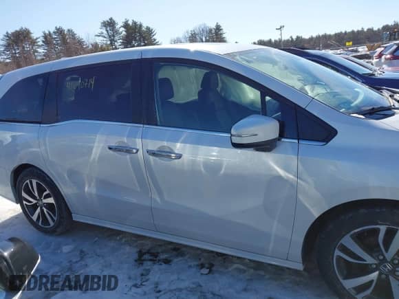 2023 Honda Odyssey Touring с VIN 5FNRL6H81PB008129, выставлен на аукционе IAAI как лот 41610714 с пробегом 57 273 миль миль и . История ставок и продаж доступна на DreamBid. Изображение 13.