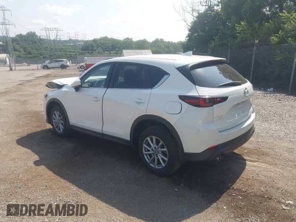 2023 Mazda CX-5 S Preferred z VIN JM3KFBCM2P0249791, wystawiony jako IAAI lot #42831354 z przebiegiem 31 858 mil mil oraz . Historia ofert i sprzedaży dostępna na DreamBid. Obrazek 3.