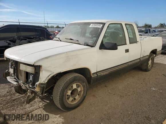 1999 Chevrolet Silverado 1500 with VIN 1GCEC19R2XR110722, listed as a Copart auction lot 82860594 with 326,724 mi miles and Salvage title. Bid and sale history available at DreamBid. Image 1.