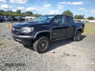 2018 Chevrolet Colorado 4WD ZR2 с VIN 1GCGTEEN4J1146565, выставлен на аукционе Copart как лот 70096565 с пробегом 51 920 миль миль и Списание • Salvage title. История ставок и продаж доступна на DreamBid. Изображение 1.