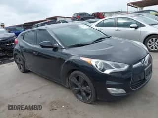 2017 Hyundai Veloster with VIN KMHTC6AD8HU324578, listed as a IAAI auction lot 42133082 with 134,676 mi miles and . Bid and sale history available at DreamBid. Image 1.