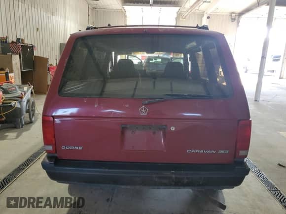1989 Dodge Caravan with VIN 2B4FK553XKR379082, listed as a Copart auction lot 71077325 with 163,844 mi miles and Salvage title. Bid and sale history available at DreamBid. Image 6.