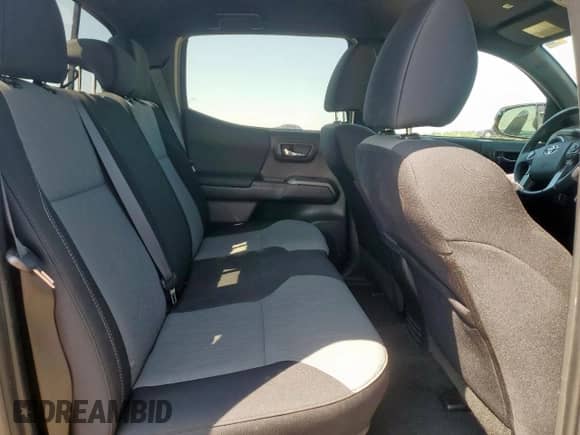 2023 Toyota Tacoma SR5 z VIN 3TMDZ5BN8PM164276, wystawiony jako Copart lot #71897075 z przebiegiem 10 600 mil mil oraz Czysty tytuł • Clean title. Historia ofert i sprzedaży dostępna na DreamBid. Obrazek 10.