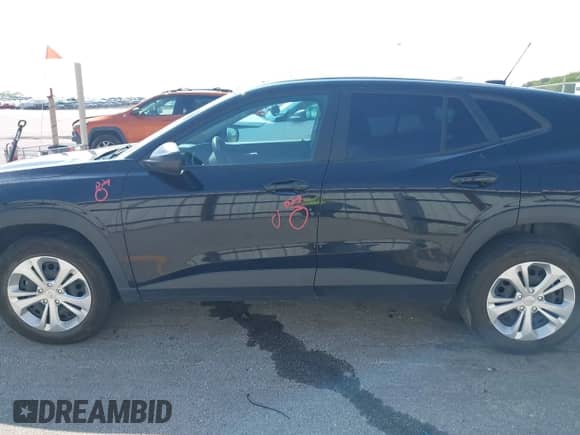 2024 Chevrolet Trax LS with VIN KL77LFE21RC025677, listed as a IAAI auction lot 42906504 with 53,679 mi miles and . Bid and sale history available at DreamBid. Image 14.