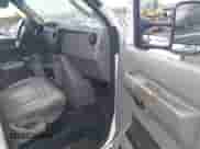 2013 Ford Econoline Cargo Commercial with VIN 1FTNE2EW7DDA65037, listed as a IAAI auction lot 43291990 with 233,281 mi miles and . Bid and sale history available at DreamBid. Image 5.