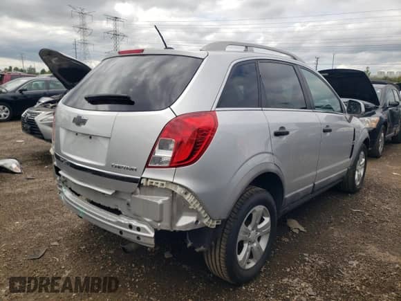 2013 Chevrolet Captiva Sport LS with VIN 3GNAL2EK7DS639936, listed as a Copart auction lot 68766224 with 70,101 mi miles and Salvage title. Bid and sale history available at DreamBid. Image 3.
