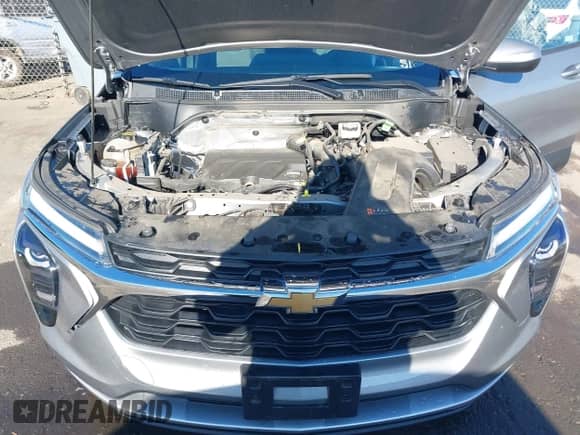 2024 Chevrolet Trax LT with VIN KL77LHE28RC184983, listed as a IAAI auction lot 43034459 with 22,164 mi miles and . Bid and sale history available at DreamBid. Image 10.