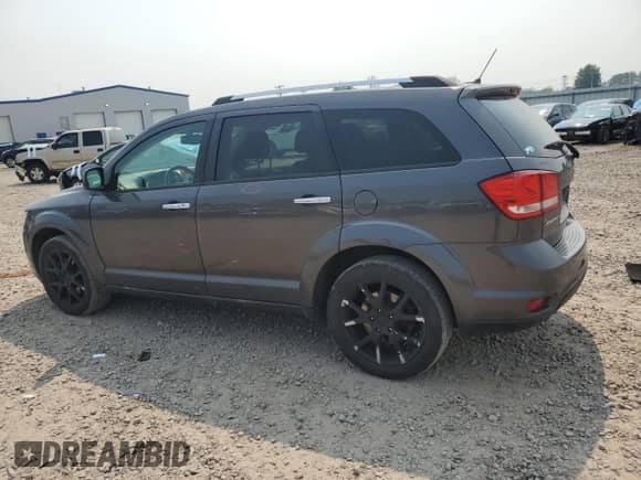 2014 Dodge Journey Limited с VIN 3C4PDCDG5ET158422, выставлен на аукционе Copart как лот 67224735 с пробегом 184 298 миль миль и Списание • Salvage title. История ставок и продаж доступна на DreamBid. Изображение 2.