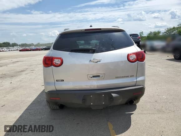 2012 Chevrolet Traverse LTZ с VIN 1GNKRLED7CJ337539, выставлен на аукционе Copart как лот 62875875 с пробегом Не указан миль и Списание • Salvage title. История ставок и продаж доступна на DreamBid. Изображение 6.
