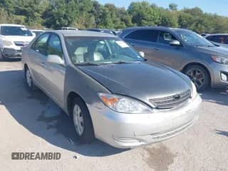 2003 Toyota Camry LE with VIN 4T1BE32K93U142477, listed as a IAAI auction lot 43383608 with 167,839 mi miles and . Bid and sale history available at DreamBid. Image 1.
