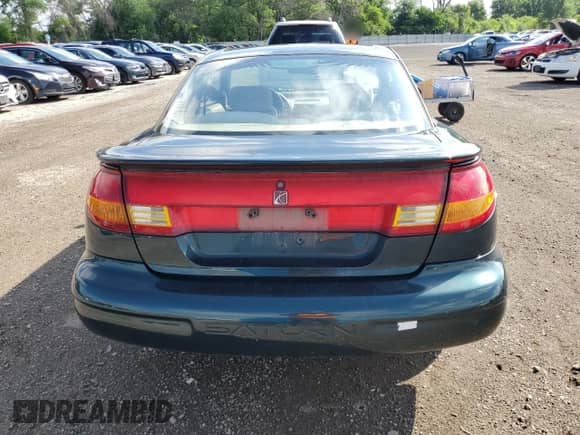 1998 Saturn SC with VIN 1G8ZH1278WZ280085, listed as a Copart auction lot 62767845 with 95,915 mi miles and Salvage title. Bid and sale history available at DreamBid. Image 6.