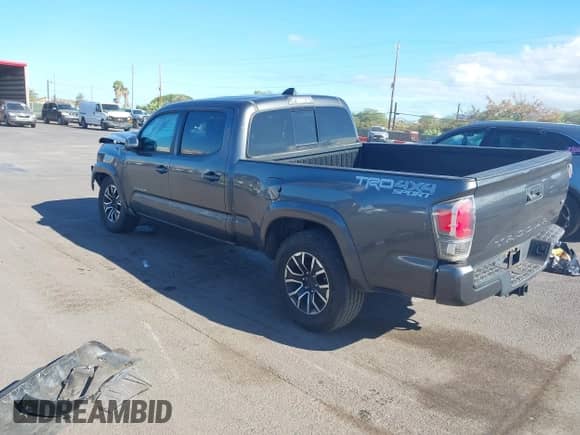 2020 Toyota Tacoma SR5 with VIN 3TMDZ5BNXLM084553, listed as a IAAI auction lot 42556448 with 74,634 mi miles and . Bid and sale history available at DreamBid. Image 3.