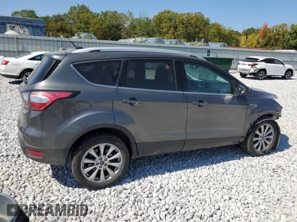 2017 Ford Escape Titanium с VIN 1FMCU9JDXHUD75370, выставлен на аукционе Copart как лот 80217015 с пробегом 145 360 миль миль и Списание • Salvage title. История ставок и продаж доступна на DreamBid. Изображение 3.