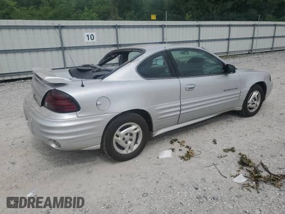 2001 Pontiac Grand Am с VIN 1G2NE12TX1M668035, выставлен на аукционе Copart как лот 59700585 с пробегом 60 965 миль миль и Списание • Salvage title. История ставок и продаж доступна на DreamBid. Изображение 3.