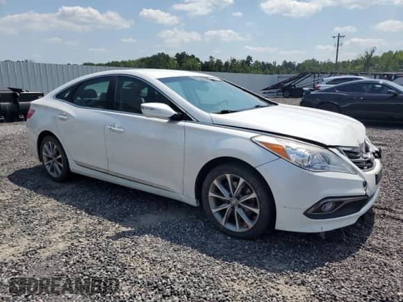 2017 Hyundai Azera с VIN KMHFG4JG8HA583184, выставлен на аукционе Copart как лот 61785895 с пробегом 133 123 миль миль и Списание • Salvage title. История ставок и продаж доступна на DreamBid. Изображение 4.