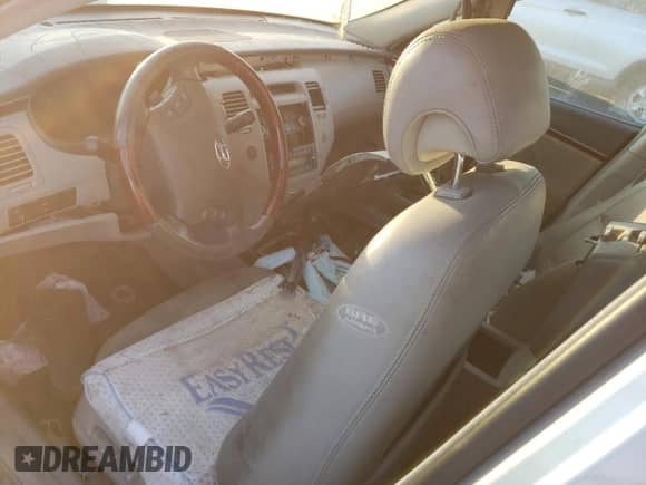 2006 Hyundai Azera SE с VIN KMHFC46F66A097420, выставлен на аукционе Copart как лот 82412104 с пробегом Не указан миль и Списание • Salvage title. История ставок и продаж доступна на DreamBid. Изображение 8.