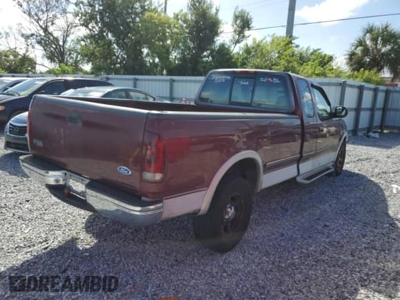 1997 Ford F-150 с VIN 1FTDX1768VNA43878, выставлен на аукционе Copart как лот 85664215 с пробегом 38 960 миль миль и Списание • Salvage title. История ставок и продаж доступна на DreamBid. Изображение 3.