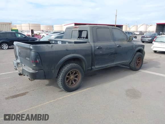 2011 Ram 1500 Outdoorsman with VIN 1D7RV1CT5BS563630, listed as a IAAI auction lot 43145055 with 114,905 mi miles and . Bid and sale history available at DreamBid. Image 4.