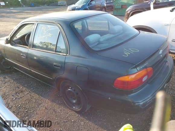 1998 Chevrolet Prizm Lsi with VIN 1Y1SK528XWZ437376, listed as a IAAI auction lot 42142292 with Not provided miles and . Bid and sale history available at DreamBid. Image 3.