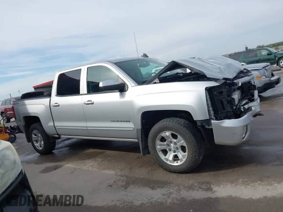 2017 Chevrolet Silverado 1500 LT with VIN 3GCUKREC0HG456350, listed as a IAAI auction lot 43325671 with 152,647 mi miles and . Bid and sale history available at DreamBid. Image 14.