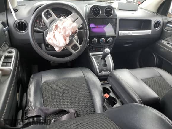 2016 Jeep Compass Latitude with VIN 1C4NJCEBXGD651394, listed as a Copart auction lot 54267375 with 110,113 mi miles and Salvage title. Bid and sale history available at DreamBid. Image 8.