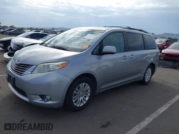 2011 Toyota Sienna XLE with VIN 5TDYK3DC7BS006817, listed as a IAAI auction lot 43410453 with 151,210 mi miles and . Bid and sale history available at DreamBid. Image 17.