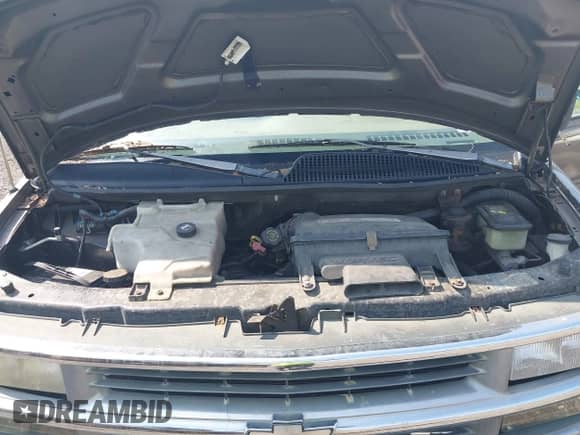 1999 Chevrolet Express z VIN 1GBFG15R2X1071275, wystawiony jako IAAI lot #42464365 z przebiegiem Nie podano mil oraz . Historia ofert i sprzedaży dostępna na DreamBid. Obrazek 10.