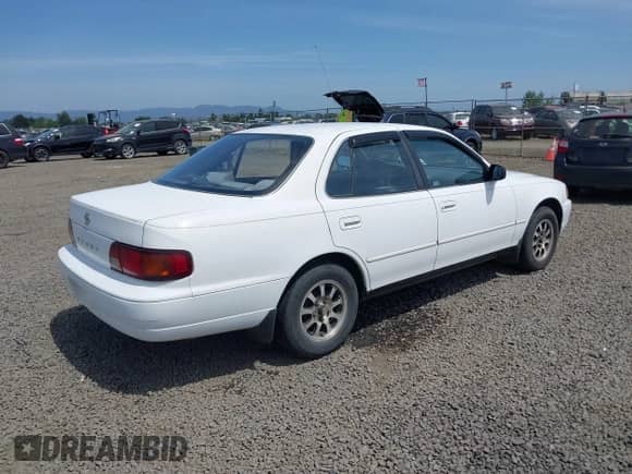 1996 Toyota Camry DX with VIN JT2BG12K7T0378581, listed as a IAAI auction lot 42454475 with 219,811 mi miles and . Bid and sale history available at DreamBid. Image 4.
