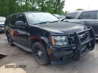 2014 Chevrolet Tahoe Commercial z VIN 1GNLC2E01ER162903, wystawiony jako IAAI lot #42126625 z przebiegiem 170 047 mil mil oraz . Historia ofert i sprzedaży dostępna na DreamBid. Obrazek 1.
