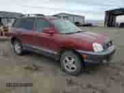 2004 Hyundai Santa Fe GLS z VIN KM8SC73D24U699035, wystawiony jako Copart lot #84775084 z przebiegiem 197 843 mil mil oraz Czysty tytuł • Clean title. Historia ofert i sprzedaży dostępna na DreamBid. Obrazek 4.