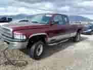 2000 Dodge 2500 with VIN 1B7KF2369YJ149502, listed as a Copart auction lot 57495855 with 427,272 mi miles and Clean title. Bid and sale history available at DreamBid. Image 1.