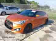 2016 Hyundai Veloster Turbo with VIN KMHTC6AE0GU273097, listed as a IAAI auction lot 43161179 with 149,883 mi miles and . Bid and sale history available at DreamBid. Image 2.