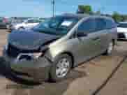 2013 Honda Odyssey LX with VIN 5FNRL5H27DB017516, listed as a IAAI auction lot 43245571 with 141,666 mi miles and . Bid and sale history available at DreamBid. Image 2.