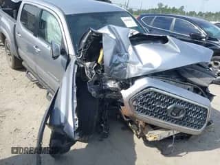 2018 Toyota Tacoma SR5 with VIN 5TFAZ5CNXJX056101, listed as a IAAI auction lot 43098402 with 47,000 mi miles and . Bid and sale history available at DreamBid. Image 1.