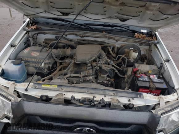 2013 Toyota Tacoma PreRunner z VIN 5TFTX4GN3DX015221, wystawiony jako IAAI lot #41301487 z przebiegiem 96 235 mil mil oraz . Historia ofert i sprzedaży dostępna na DreamBid. Obrazek 10.