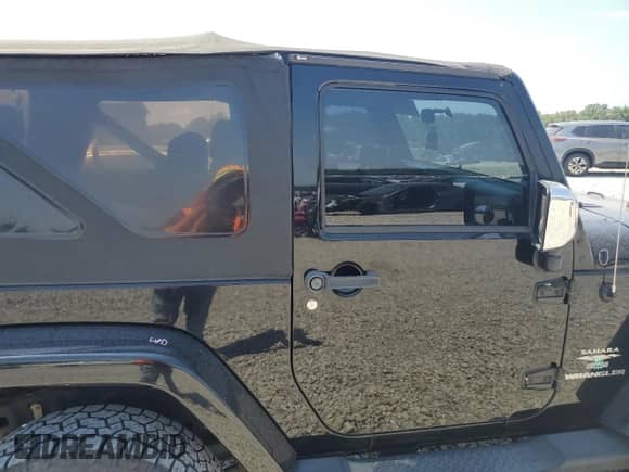 2007 Jeep Wrangler Sahara z VIN 1J4FA54157L212192, wystawiony jako Copart lot #63062135 z przebiegiem 146 048 mil mil oraz Szkoda całkowita • Salvage title. Historia ofert i sprzedaży dostępna na DreamBid. Obrazek 11.