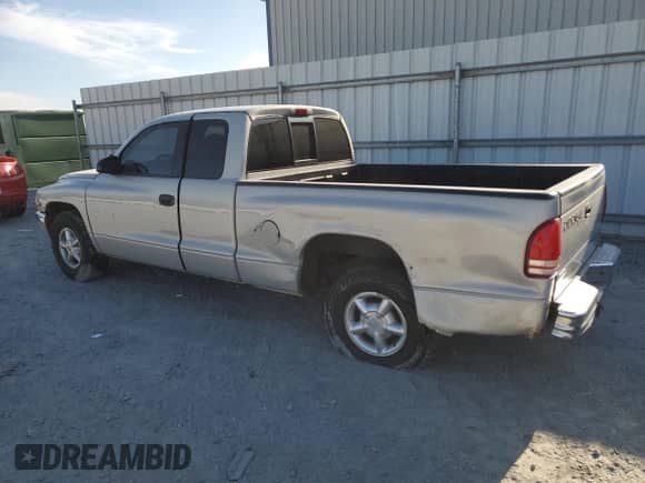 1998 Dodge Dakota SLT with VIN 1B7GL22XXWS563954, listed as a Copart auction lot 46836855 with 134,553 mi miles and Salvage title. Bid and sale history available at DreamBid. Image 2.