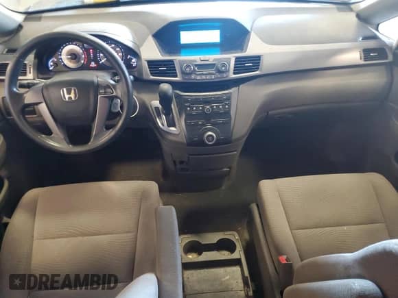 2012 Honda Odyssey LX z VIN 5FNRL5H26CB117587, wystawiony jako Copart lot #71431495 z przebiegiem 183 045 mil mil oraz Czysty tytuł • Clean title. Historia ofert i sprzedaży dostępna na DreamBid. Obrazek 8.