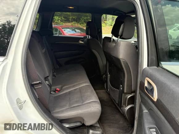 2014 Jeep Grand Cherokee Laredo z VIN 1C4RJFAG3EC352501, wystawiony jako Copart lot #80498255 z przebiegiem 134 245 mil mil oraz Czysty tytuł • Clean title. Historia ofert i sprzedaży dostępna na DreamBid. Obrazek 6.