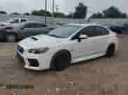 2020 Subaru WRX Premium with VIN JF1VA1C62L9814875, listed as a Copart auction lot 70986585 with 76,047 mi miles and Salvage title. Bid and sale history available at DreamBid. Image 1.