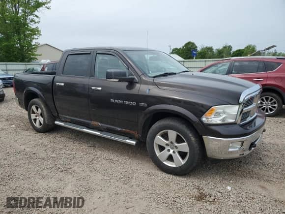 2011 Ram 1500 SLT with VIN 1D7RV1CT9BS565557, listed as a Copart auction lot 58813285 with 145,638 mi miles and Clean title. Bid and sale history available at DreamBid. Image 4.